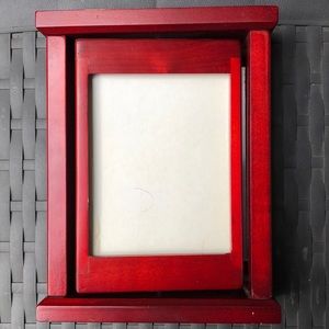 Picture frame and pen holder in one